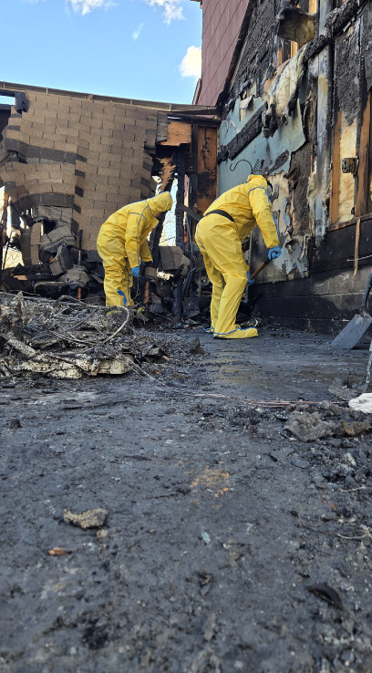 Fire damage restoration team working on a property